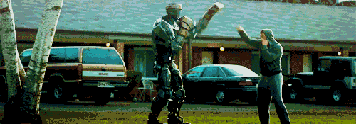 man and robot shadow boxing