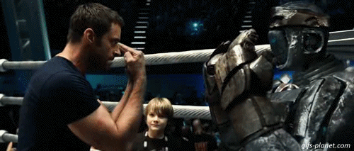 man gesturing to robot